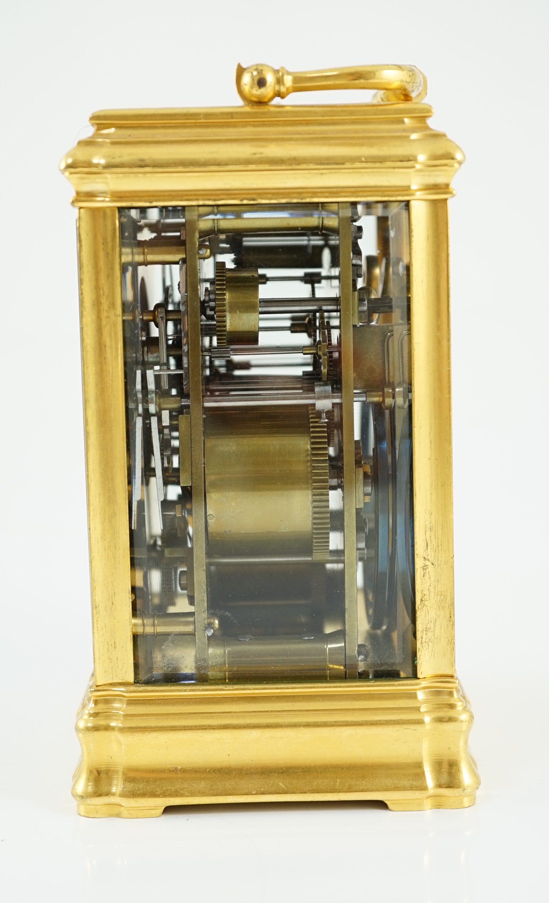 An early 20th century French ormolu Grande Sonnerie alarum clock, with enamelled Arabic dials and gorge case, movement striking on two blued steel gongs, 10cm wide, 9cm deep, 15.5cm high
